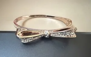 Authentic KATE SPADE ROSE GOLD PLATED PAVE CRYSTALS BOW BANGLE HINGED BRACELET
