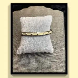 Authentic Kate Spade Gold Plated Cream Enamel dotted bangle Bracelet