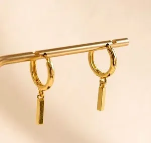 Authentic Celestial Beam Huggie Drops: Radiant Vessels of Golden Light