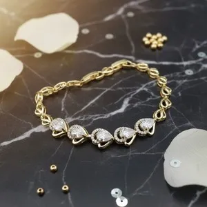 Authentic Gold Plated Pear Cut Crystal Tennis Bracelet. Size: 7 inches