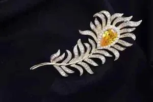 Authentic Radiant Plume Moissanite Brooch in 14K Yellow Gold