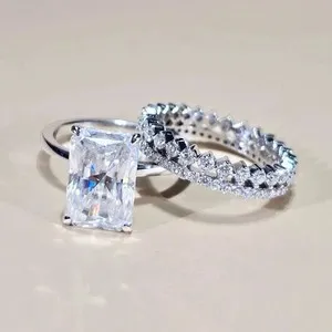 Authentic The Eternal Luminescence Radiant Moissanite and 14K White Gold Plated Sacred Union Ring