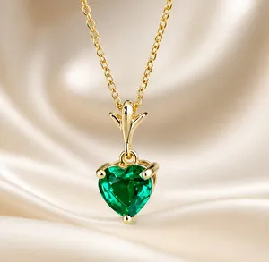 Authentic Enchanted Heart‑Emerald Amulet – 2‑Carat Gold‑Veiled Pendant