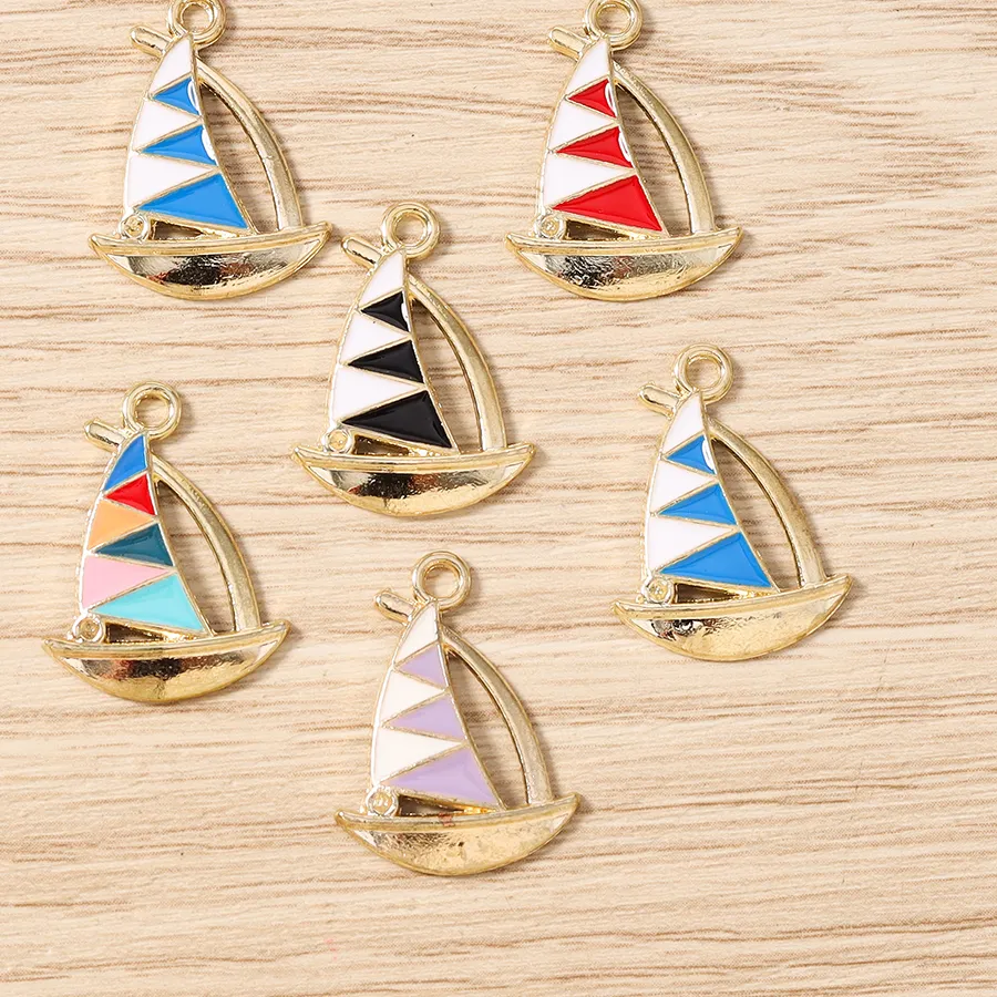 Authentic Voyagers of the Infinite Tide: Enameled Sailboat Talismans