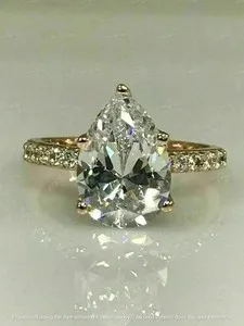 Authentic Eternal Devotion: A Radiant 2.50ct Pear-Cut Diamond in 14k Golden Splendor