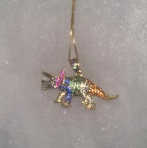 Authentic The Primordial Guardian: A Gold-Plated Triceratops Talisman