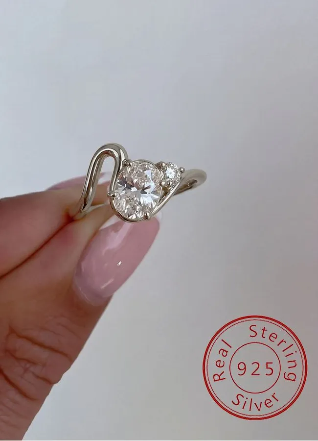 Authentic Waves of Eternity: Sterling Silver Oval Zircon Ring for the Modern Goddess