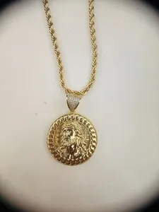 Authentic 14kt gold plated brand pendant with 14kt gold plated Rope chain.