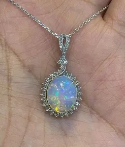 Authentic Ember of Hope: 3Ct Oval Cut Lab Created Fire Opal Halo Pendant