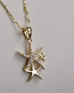 Authentic Celestial Radiance Star Pendant - Luminescent Gold-Plated Astral Talisman