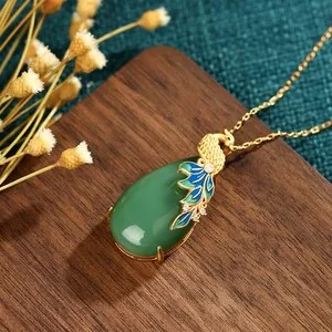 Authentic The Verdant Guardian: Peacock Jade Amulet in Gilded Light