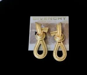 Authentic Entwined in Elegance: Mystical Gold-Plated Knot Earrings