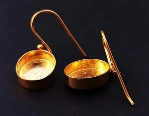 Authentic Guardians of Radiant Light: Elegant Oval Bezel Earrings