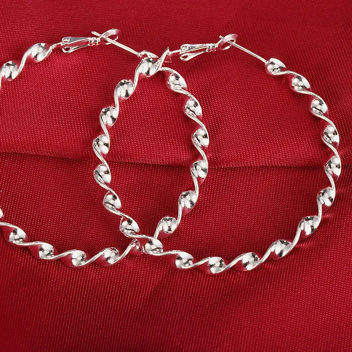 Authentic Ethereal Ripple Hoops: Cascading Circles of Radiant Grace