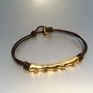 Authentic NWT UNO DE 50 DIATOMEA 18 K GOLD PLATED BRACELET 6 1/4” L