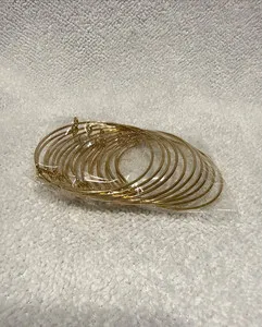 Authentic Celestial Gold‑Plated Infinity Bangle Set – 10 Adjustable Charms