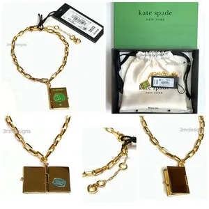 Authentic NWT Kate Spade OUT OF OFFICE 12-K Gold Plated Passport Open Charm Bracelet