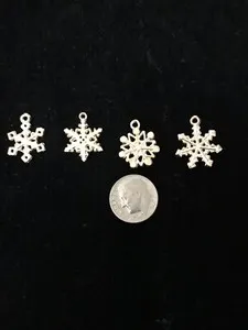 Authentic Snowflakes Set Of 4 Piece Gold plated charm pendant