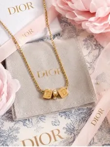 Authentic Unlock the Sacred Geometry of Fortune with Christian Dior's CD Cube of Abundance