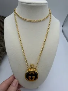 Authentic The Golden Interlock: Vintage Gucci GG Perfume Bottle Talisman