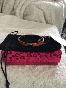 Authentic Authentic Coach Rivet Enamel Hinged Bangle Gold Plated/ Red No Dust Bag