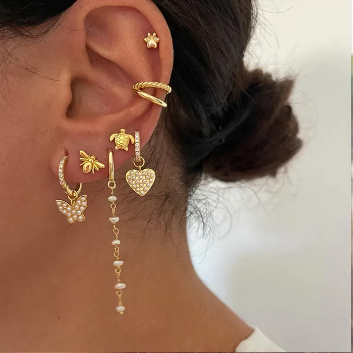 Authentic Celestial Totem Studs: A Menagerie of Spiritual Guidance and Elemental Grace