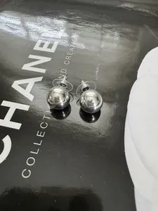Authentic Celestial Orbs of Gilded Light Ball Stud Earrings