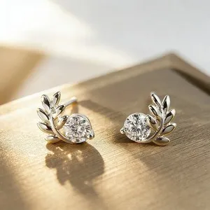 Authentic Moonlit Whisper: 2Ct Moissanite Leaf Stud Earrings in 14K White Gold Plated