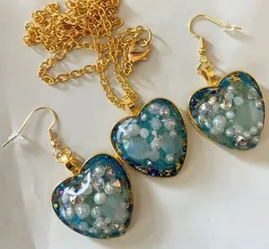 Authentic Celestial Heart Radiance Pendant and Earring Set in Golden Embrace