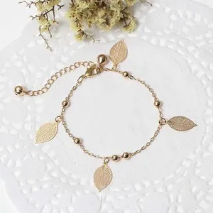 Authentic SEXY SPARKLES Filigree Stamping Bell Bracelet Gold Plated Whit Hollow Leaf Pend