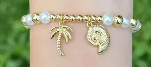 Authentic Beaded bracelets with marine charms and pearls with 18-karat gold-plated