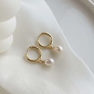 Authentic Radiant Luminescence Pearl Huggie Hoops in 18K Gold
