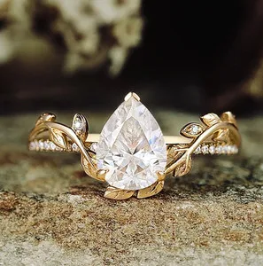 Authentic Enchanted Verdant Whisper: 2‑Ct Pear‑Shaped Moissanite Ring in Sacred Gold