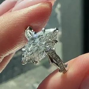 Authentic Whispers of the Verdant Bloom: Moissanite Marquise Ring