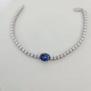 Authentic Celestial Harmony: Majestic Oval Blue Sapphire Tennis Bracelet