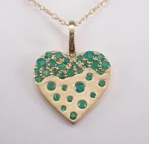 Authentic 0.60Ct Round Cut Lab Created Green Emerald Heart Pendent 14k Yellow Gold Plated.
