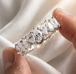 Authentic The Infinite Radiance Pear Moissanite Eternity Band