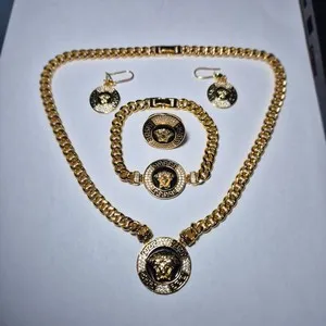 Authentic full set of gold plated accessories, versace model