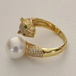 Authentic Whispers of the Wild: The Leopard's Pearl Embrace Ring