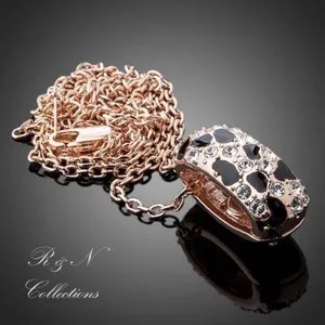 Authentic Swarovski‑Gleaming Leopard Pendant – 18K Rose Gold Enchantment