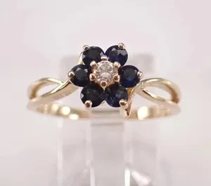 Authentic 2Ct Round Cut Lab-Created Sapphire Flower Wedding Ring In 14K Yellow Gold Plated