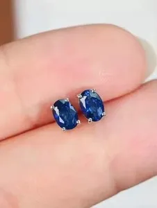 Authentic Lab Created Blue Sapphire Oval Cut Womens Stud Earrings in 14K White Gold Plated