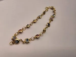 Authentic Celestial Bloom: The Golden Eye Protection Bracelet