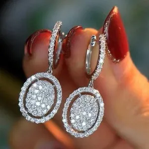 Authentic Celestial Orbits: White Gold-Plated Oval Earrings of Infinite Harmony