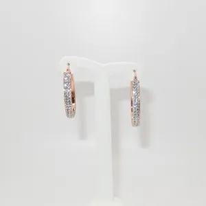 Authentic Whispers of Dawn: Rose Gold Oval Hoop Earrings