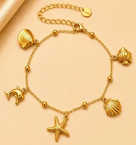 Authentic Tides of Fortune: 18k Gold Plated Cable Chain Sea Life Charms Bracelet