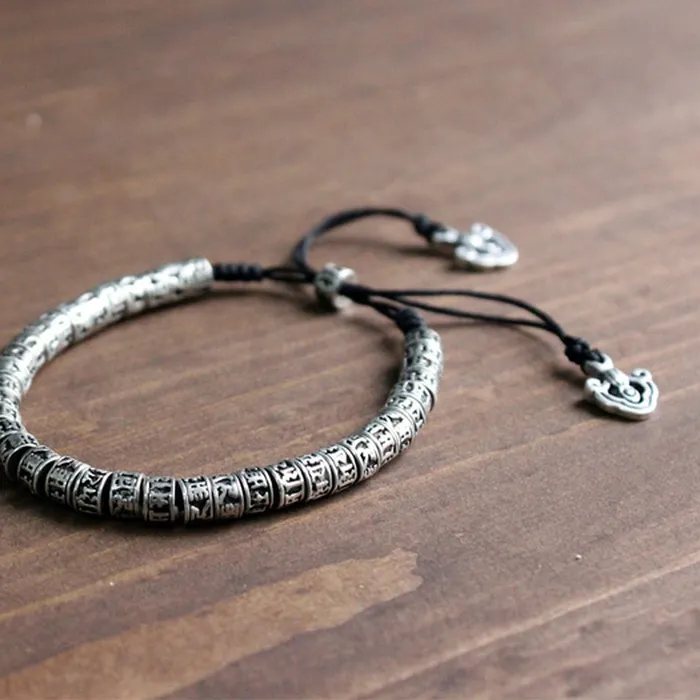 Authentic Amulet of the Whispering Mantra: Om Mani Padme Hum