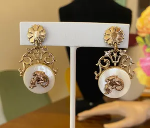 Authentic Ancient Dragon's Whisper: Gold‑Plated Dangle Earrings of the Pik York