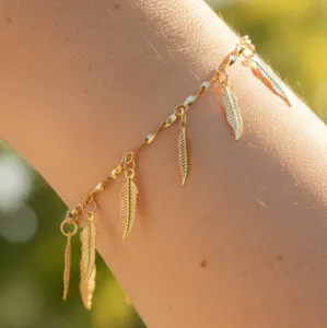 Authentic The Golden Plume: Celestial Feather Dangle Bracelet