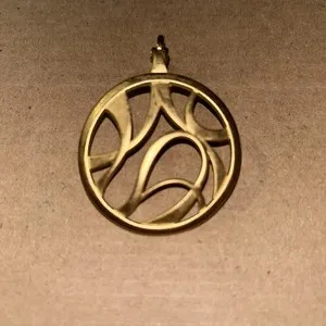 Authentic The Pizazz of Eternity: Gold-Plated Abstract Circle Talisman